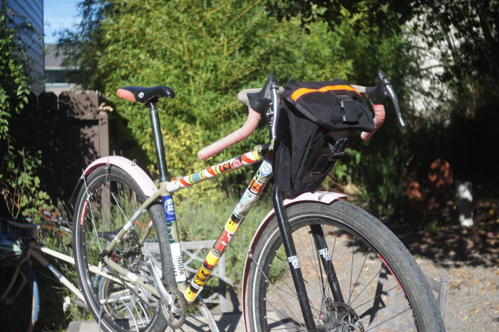 fat-tire road bike with a front bag carradice seat bag as a handlebar bag