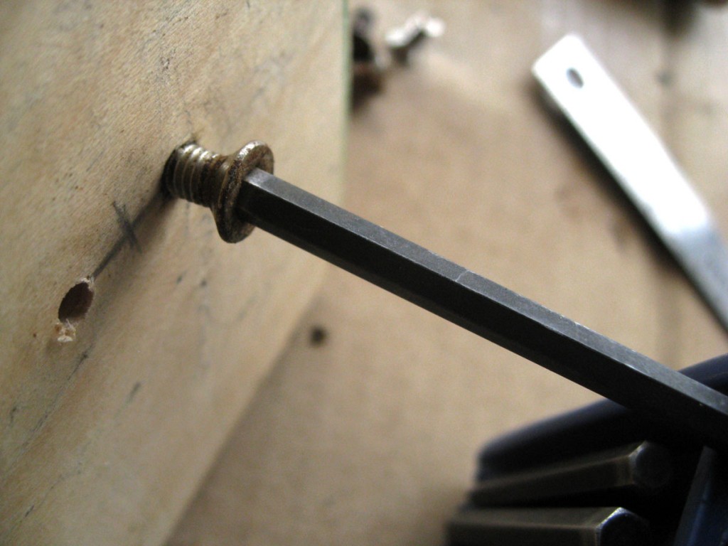 run the cleat bolt into the hole, cutting the threads