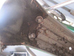 drawbolt nuts on the inside of the fender