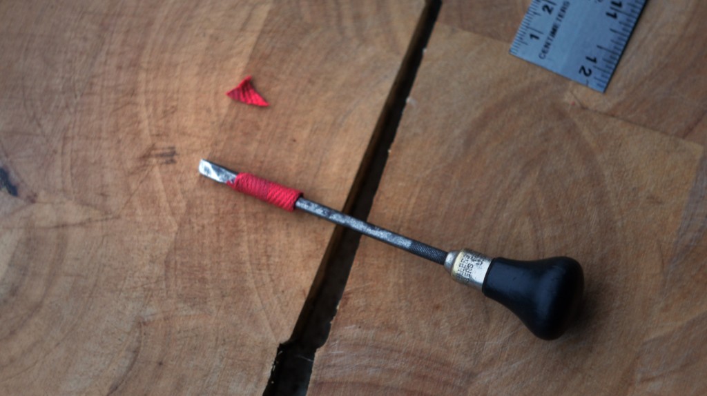 wrap the tape tightly around the screwdriver shaft